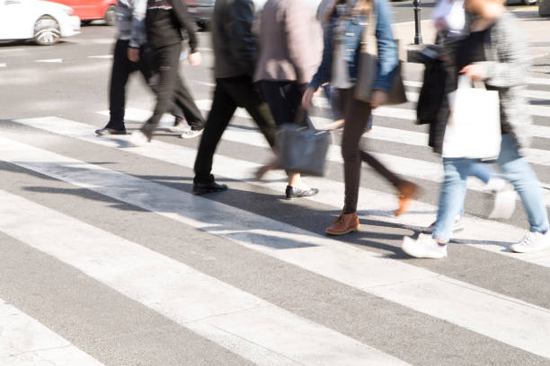 istock People crossing a street 863270072