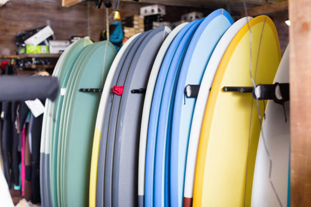 istock Image of colorful surfboard standing in store 863282492