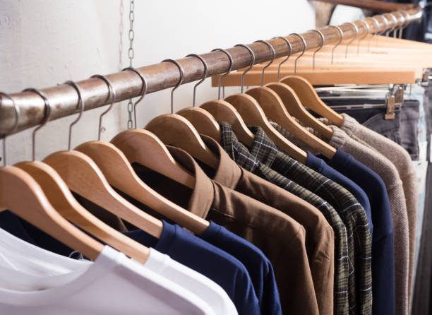 istock different colored clothes in the modern shop 863282500