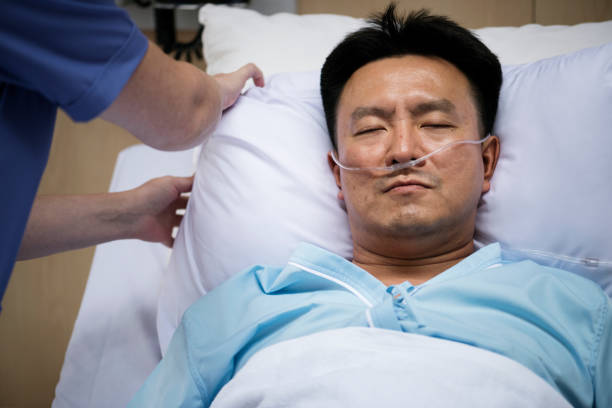 istock A sick Asian man in a hospital 863300988