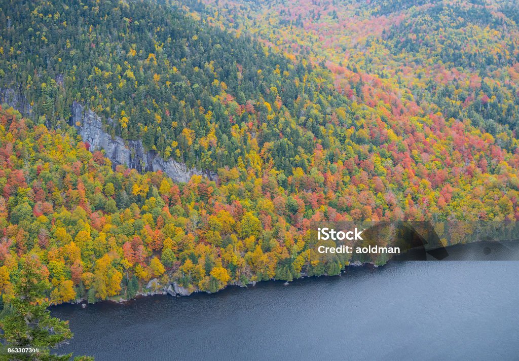 Cliff over Lower Ausable Lake in Adirondacks Cliff over Lower Ausable Lake in Adirondack Mountains Apostasy Stock Photo