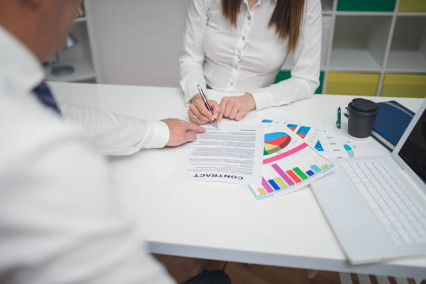 istock Lady signing the contract 863314994