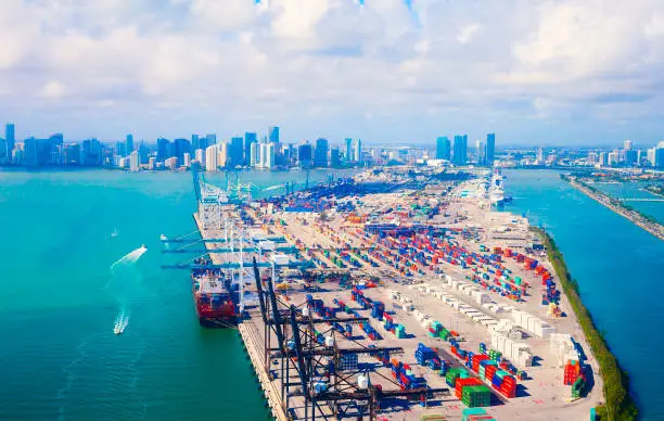 Aerial view of Miami harbor and downtown with container ship in Florida