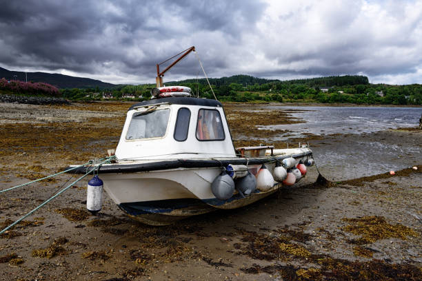 Fishing boat in the Wadden Sea at low tide