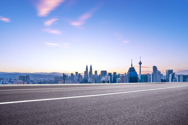 istock empty asphalt road with cityscape of modern city 863326764