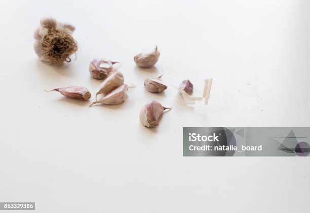 Unpeeled Garlic Cloves Stock Photo - Download Image Now - Australia, Backgrounds, Cooking