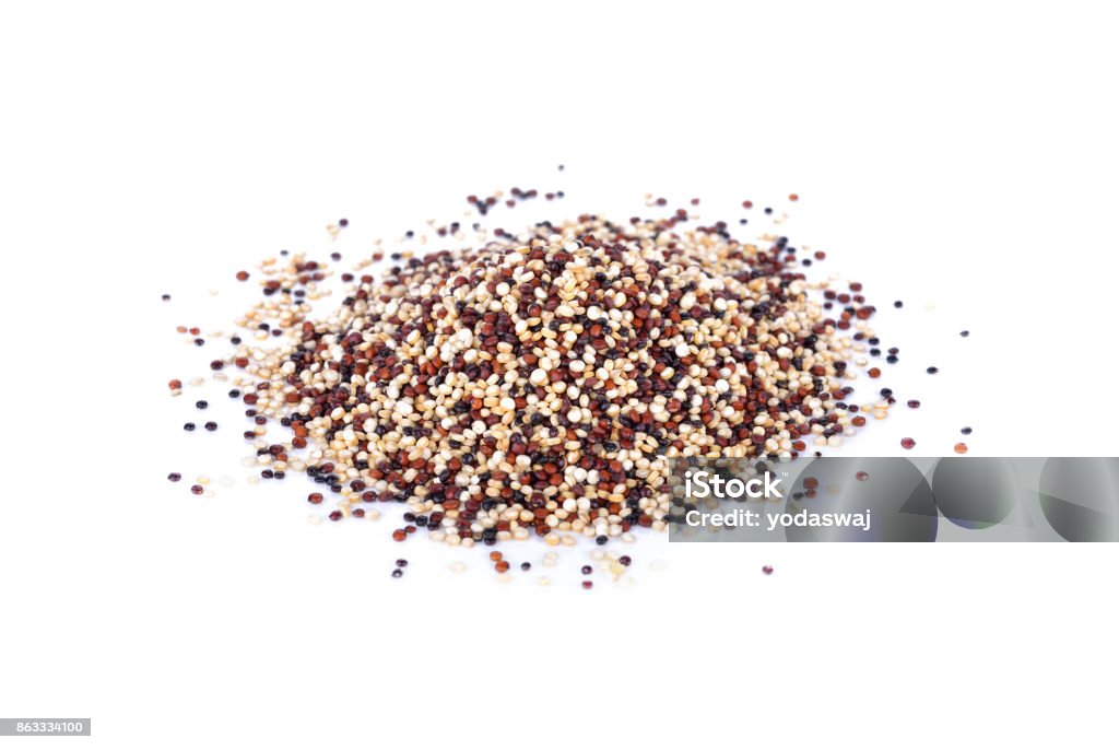 pile of dry tricolor quinoa seeds on white background Quinoa Stock Photo