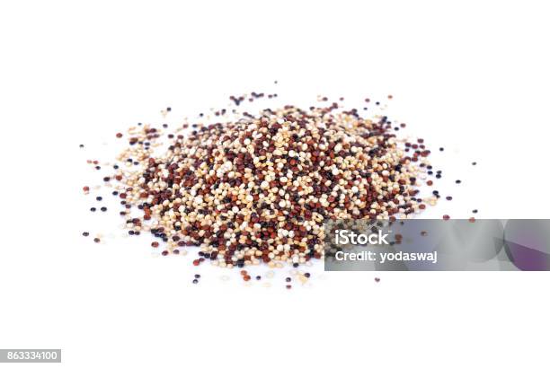 Pile Of Dry Tricolor Quinoa Seeds On White Background Stock Photo - Download Image Now