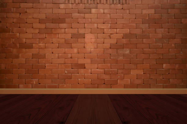 istock interior room. brick wall and wooden floor 863339454