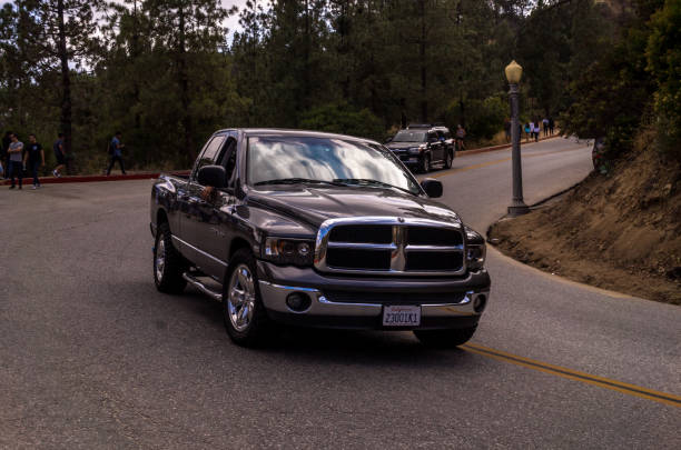 Los Angeles, California, USA - June 12, 2017: Highway and car pickup brand Dodge in Griffith Park, Hollywood Hills, Los Angeles. The famous tourist and science attraction of Los Angeles. A popular place for picnics and rest.