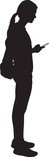 Teen Girl Holding Smart Phone Vector silhouette of a teen girl holding a smart phone. silhouette-of-a-people-talking-on-phone stock illustrations