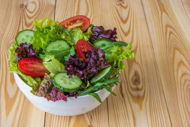 istock Fresh salad with mixed greens, cherry tomato and cucumber 863345148