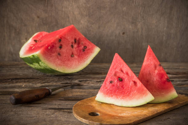 istock Watermelon on the wooden background. Organic watermelon 863345232