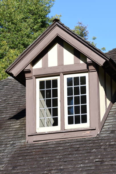 istock cedar shake roof and dormer windows 863348384