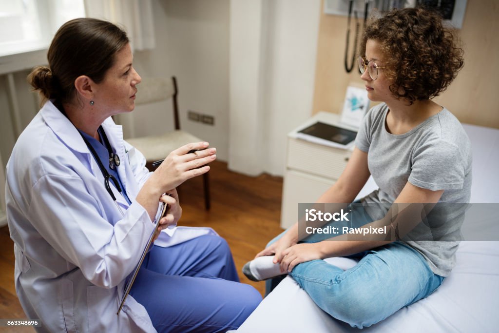 Doctor is checking a patient Doctor Stock Photo