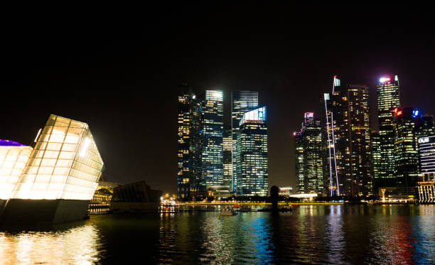 istock Singapore skyline at night in Singapore. 863348806