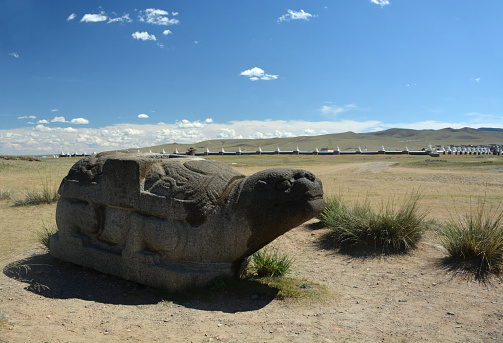 A stone turtle stands as one of the last remaining signs of the ancient Mongolian city of Karakorum.