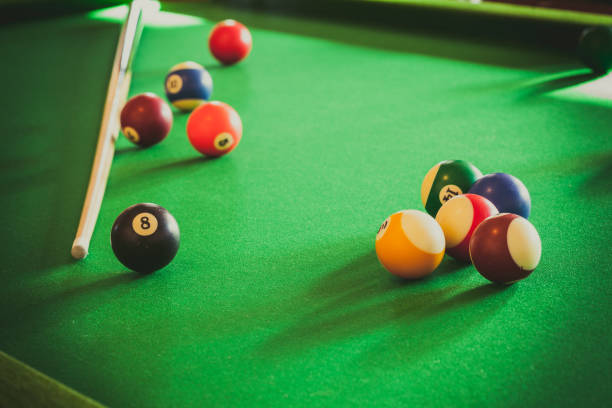 istock Snooker ball and stick on billiard table 863361826