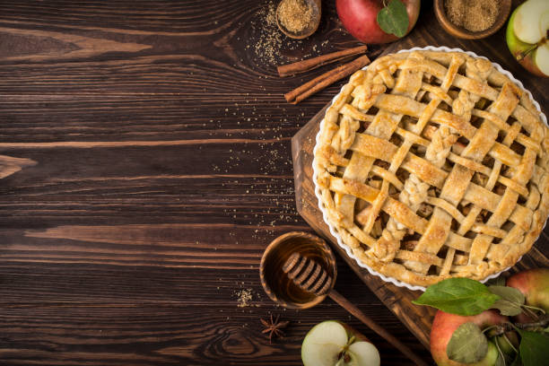 istock apple pie and ingredients on wooden background 863383386