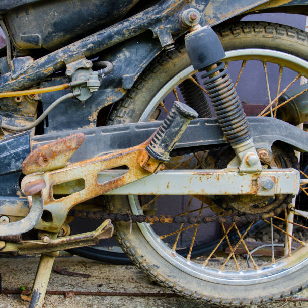 Old motorcycle parked on the wayside