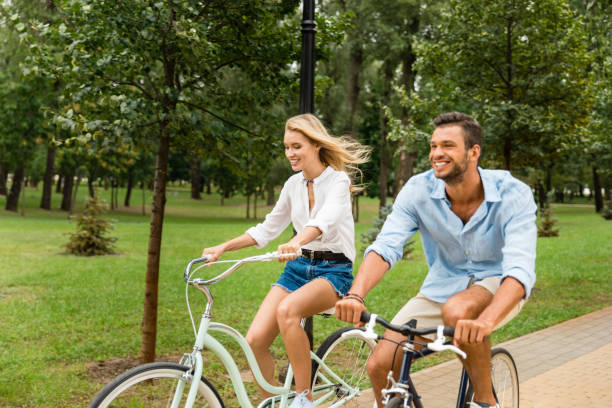 istock happy couple riding bicycles 863436252