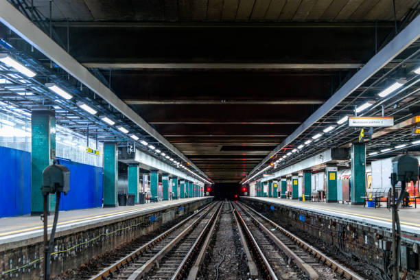 istock London's Underground, empty track and platform at Moregate station. 863444696