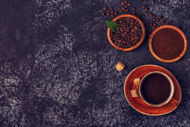 istock Coffee cup, beans, ground powder and sugar 863444796