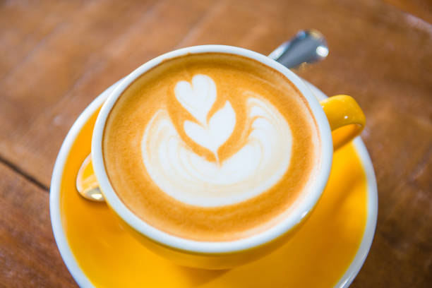 istock Coffee cups with latte art in cafe 863456338