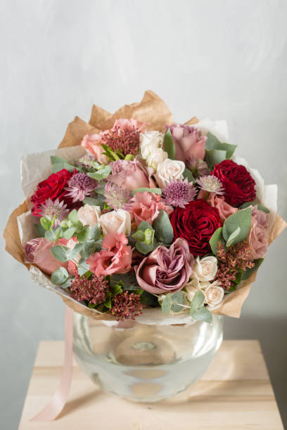 istock Flower composition on a gray background. Wedding and Festive decor. Bouquet from spring flowers. copy space 863481672