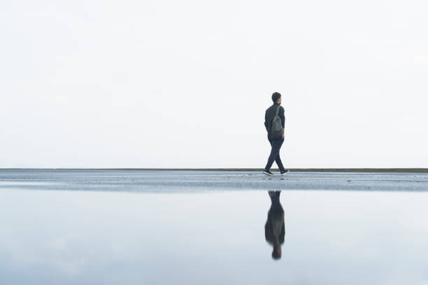 istock young male athlete taking a walk after a morning rain 863482132