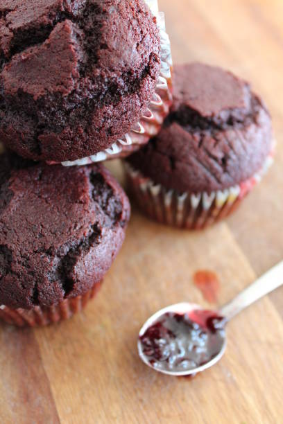 istock Delicious Chocolate Muffins and a Spoon full of Jam 863488884
