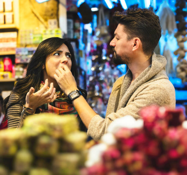 istock Young tourist couple eat Turkish Delight 863488996