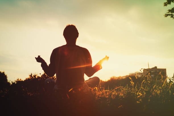 istock serenity and yoga practice at sunset 863499996