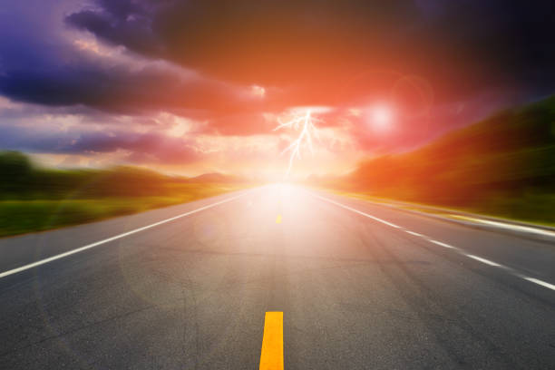 istock landscape of storm clouds above asphalt road 863501106