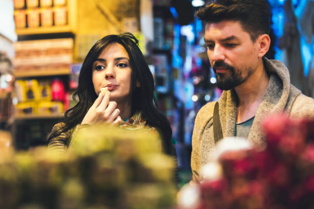 istock Young tourist couple eat Turkish Delight 863505640