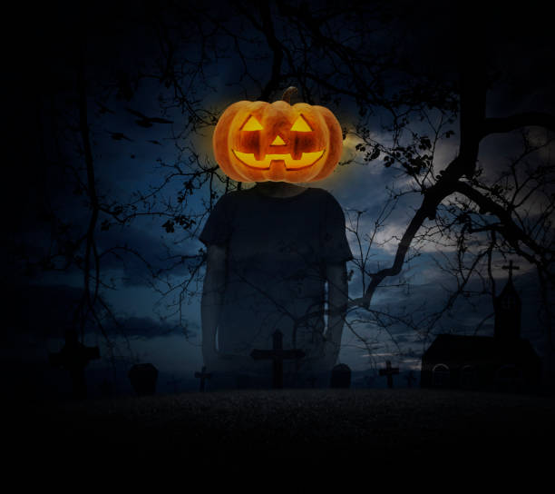 istock Pumpkin monster head on man body standing over spooky cloudy sky 863508306