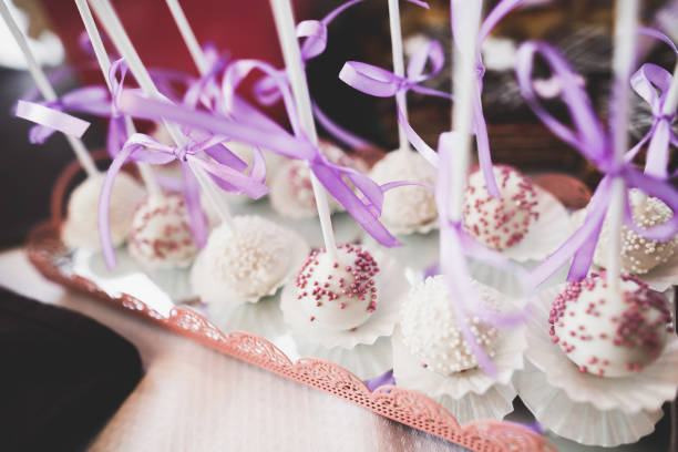 istock Delicious sweets on wedding candy buffet with desserts, cupcakes 863515458