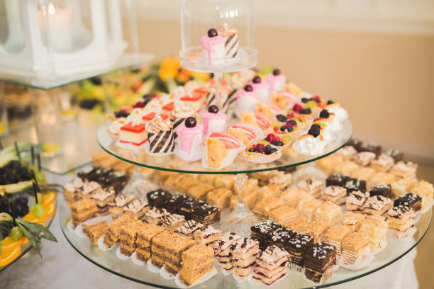 istock Delicious sweets on wedding candy buffet with desserts, cupcakes 863517248