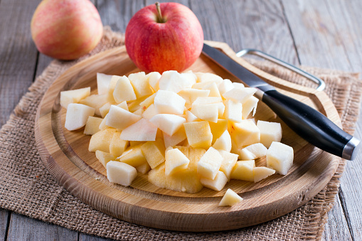 Cubes of apple on a cutting board