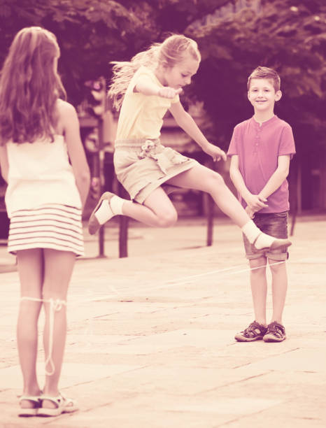 istock children with chinese jumping rope 863521532