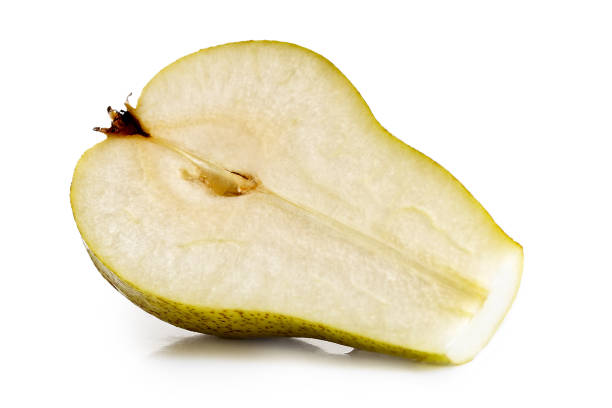 istock Half of an abate fetel pear isolated on white. 863524278