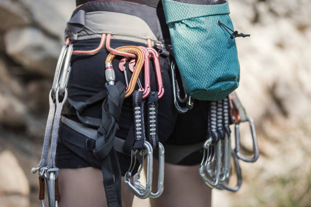 istock Safety harness with carabiners for rock climbing 863524600