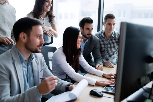 istock Young businesspeople working on computer in office 863525314