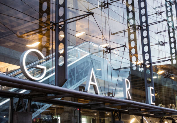 A sign for Gare ('train station in French') on a modern station in the Montparnasse district of Paris.