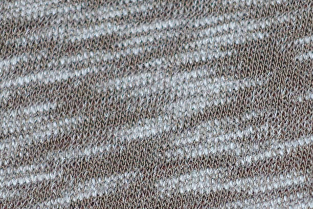 istock Beige and brown textile tricot fabric background 863536266