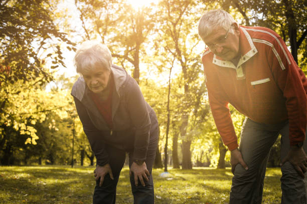 istock Tired senior couple resting after exercising. 863542098