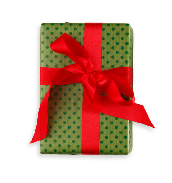 istock Gift box wrapped in green paper and red ribbon 863555742