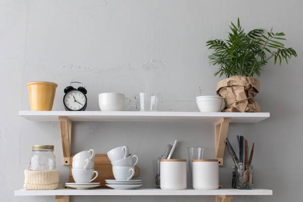 istock Utensils and mugs on shelf 863559786