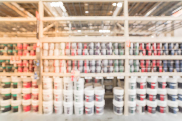 istock Blurred rack of paint cans in home improvement hardware store USA 863568166