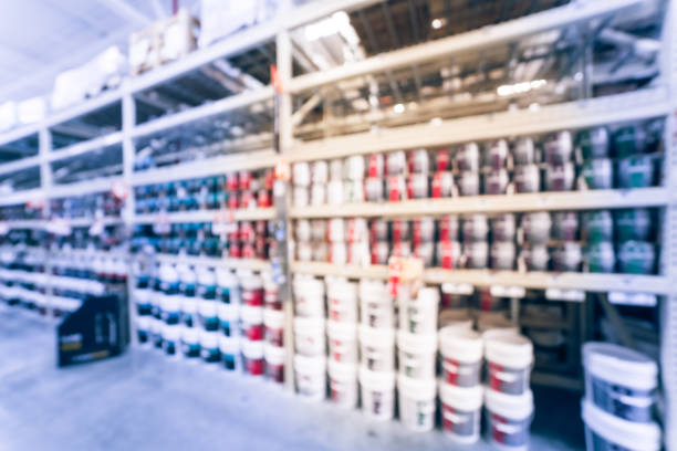 istock Blurred rack of paint cans in home improvement hardware store USA 863568728